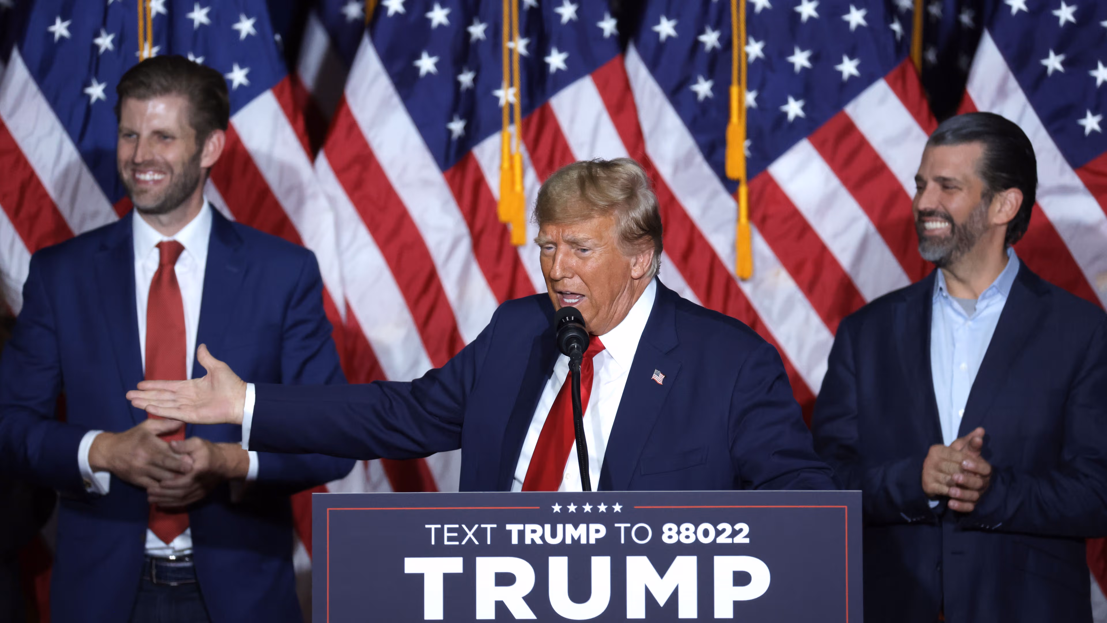 Donald Trump (center) pictured with sons Eric Trump (left) and Donald Trump Jr. (Alex Wong/Getty Images)