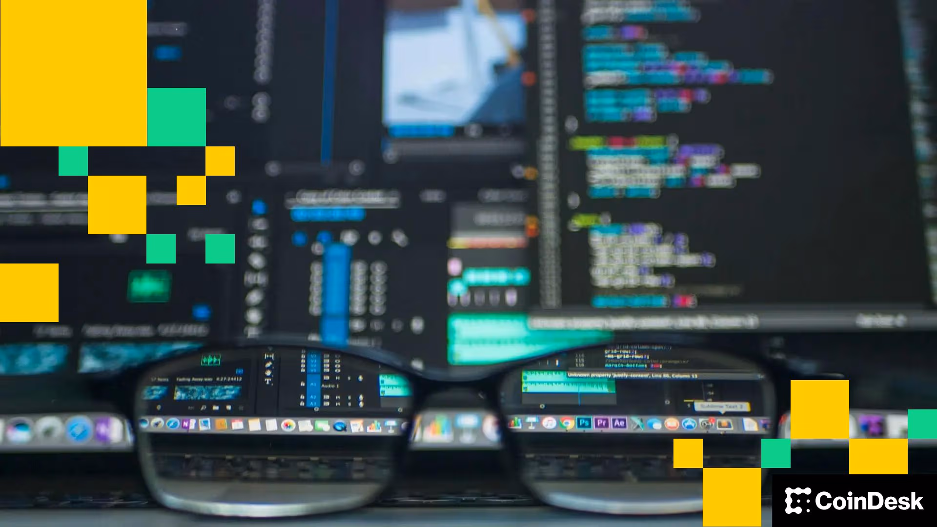 Glasses in front of monitors with code (Kevin Ku/Unsplash)